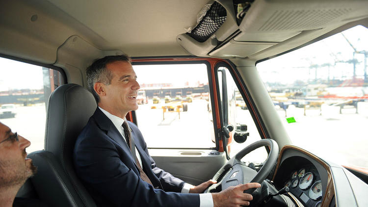 Mayor Eric Garcetti test drives an electric truck